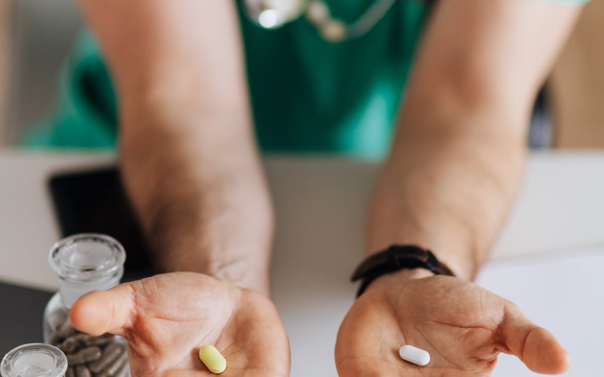 GLP-1 medication on a clinical surface — coordinated with your doctor for safe use alongside coached training
